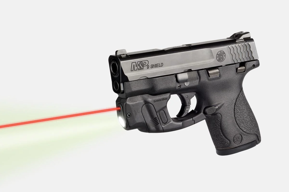 primary-41918 LaserMax CenterFire Light & Laser w/GripSense, black unit on pistol in right-side view with red beam