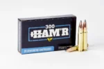 Wilson Combat HAM R Ammunition black box with three brass cartridges, front three-quarter view