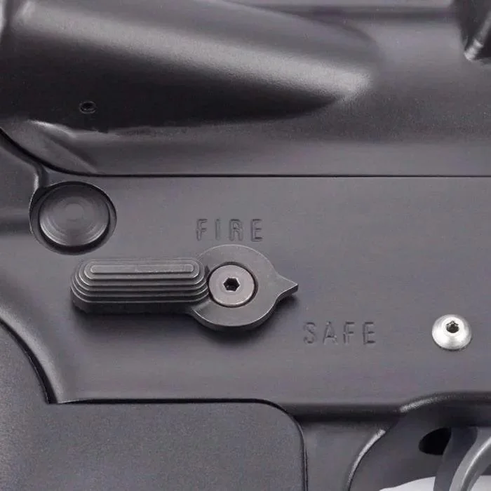 primary-42073 Wilson Combat Ambidextrous AR Safety Selector, close-up installed on black receiver with fire and safe marks