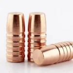 Lehigh .458 cal 380gr Wide Flat Nose bullets, three copper-colored solids with grooved sides
