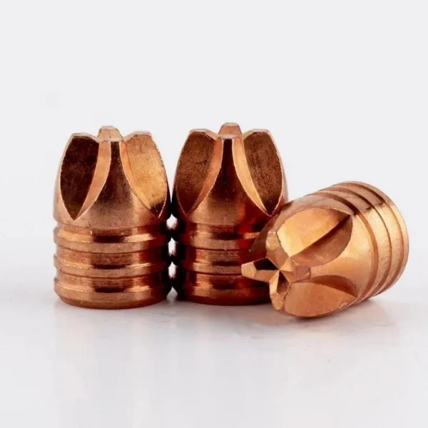 Lehigh Xtr Defense LF, three copper bullets with fluted tips, angled view