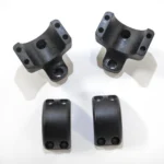 DNZ 2-Piece Game Reaper 2, four black scope mount pieces arranged in top and side views