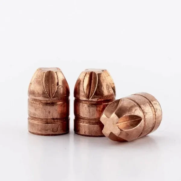 Lehigh .400 caliber 140gr Xtreme Penetrator bullets, three copper projectiles, close-up view