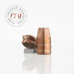 Lehigh Defense Xtreme Defense copper-colored bullets, front view with one upright and one expanded