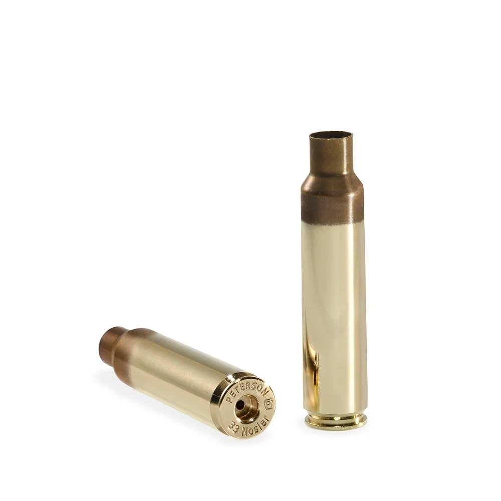 primary-42277 Peterson Unprimed Rifle Brass 33 Nosler, two brass cases shown upright and on side