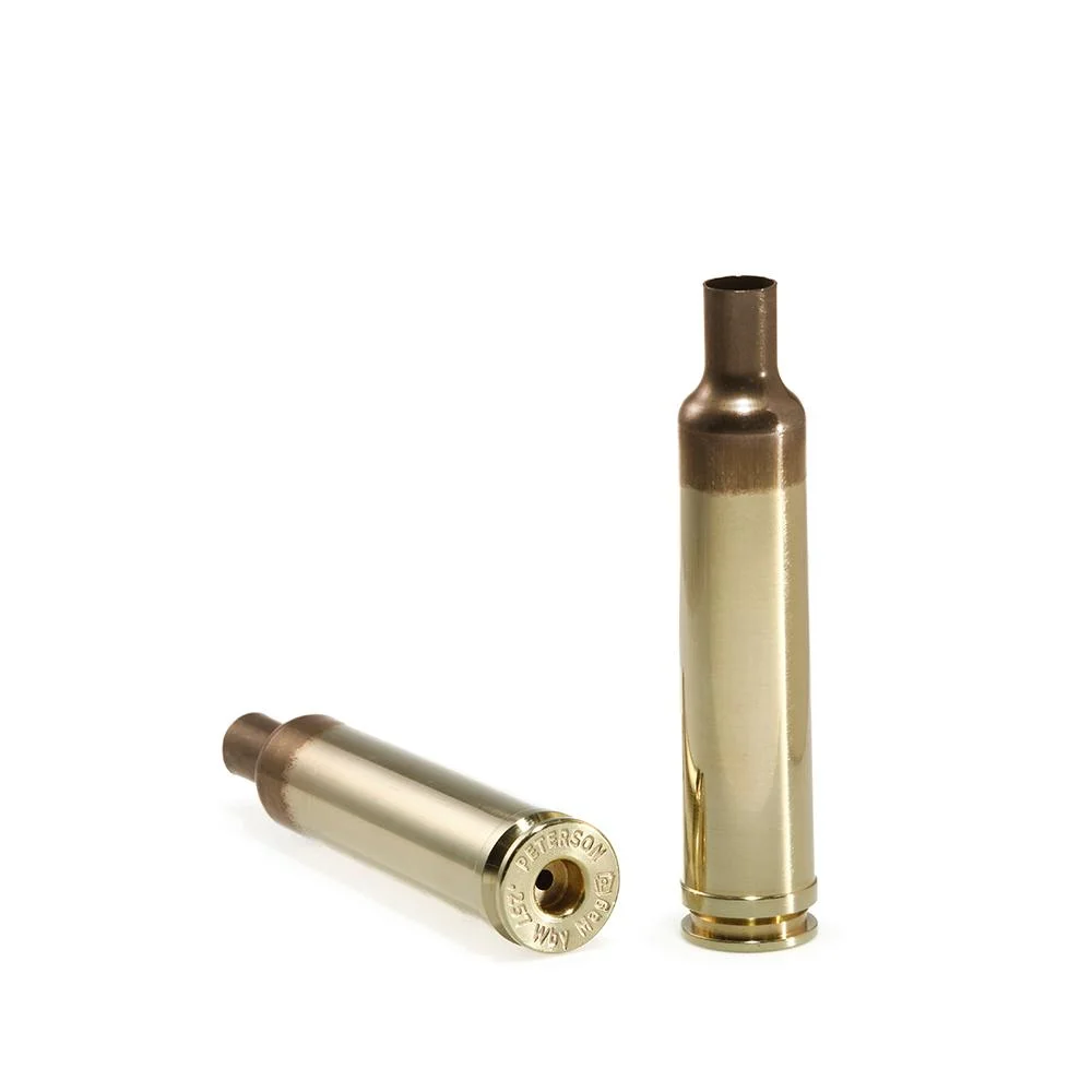 primary-42286 Peterson Unprimed Rifle Brass 257 Weatherby, two gold brass cases upright and on side