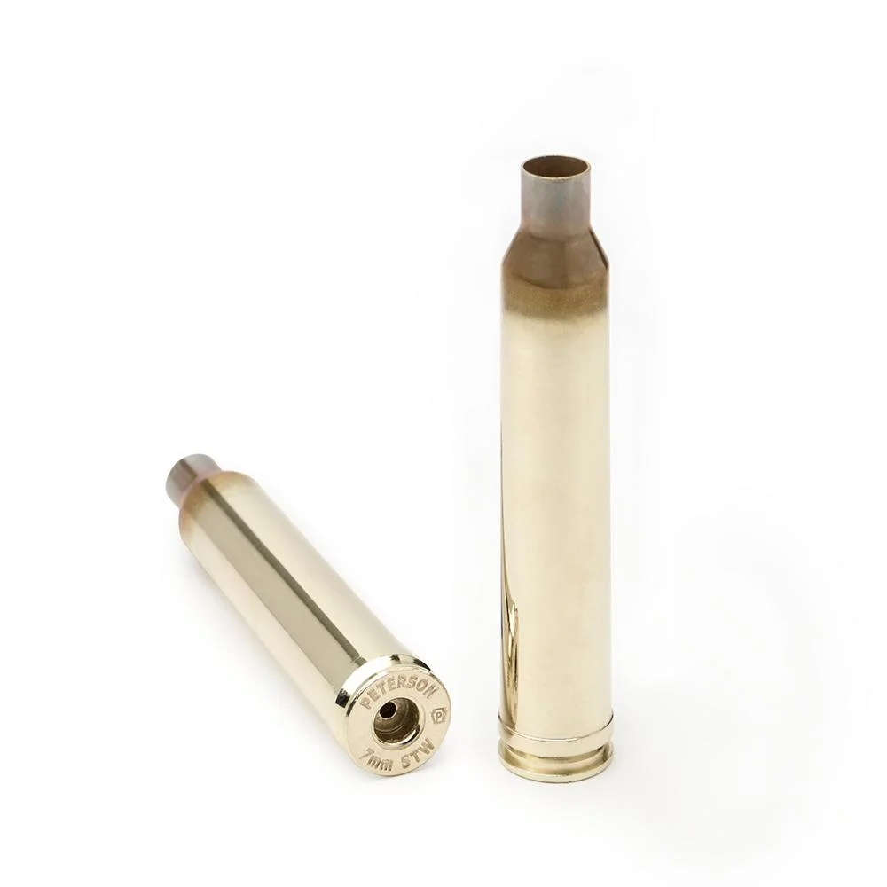 primary-42302 Peterson Unprimed Rifle Brass 7mm STW, two brass cases shown upright and angled