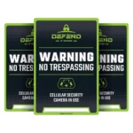 Tactacam Defend No Tresspassing Sign, front view of three black and green warning signs