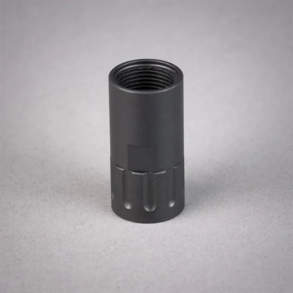 SilencerCo Delta Adapter black cylindrical threaded adapter, angled top view