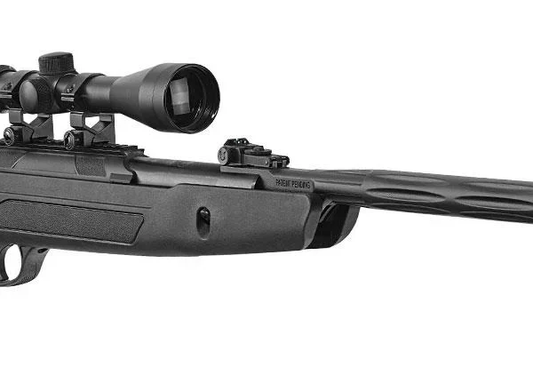 Hatsan AirTact ED Combo air rifle, side view in black with mounted scope and ventilated stock