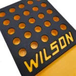 L.E. Wilson Reloading Tray with Bullet/Primer Cup, black and yellow top view with 25 holes
