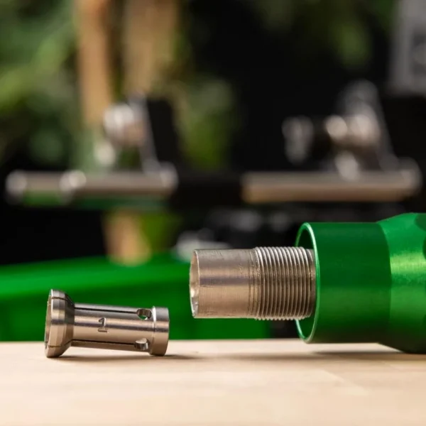 RCBS Matchmaster Trimmer Collet #1, close-up beside green trimmer body and threaded fitting