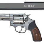 Snapsafe Handgun Hangers, black undershelf hanger shown supporting a silver handgun
