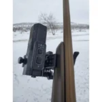 Browning Aspect Cam, black camera mounted beside a gun barrel in a snowy setting