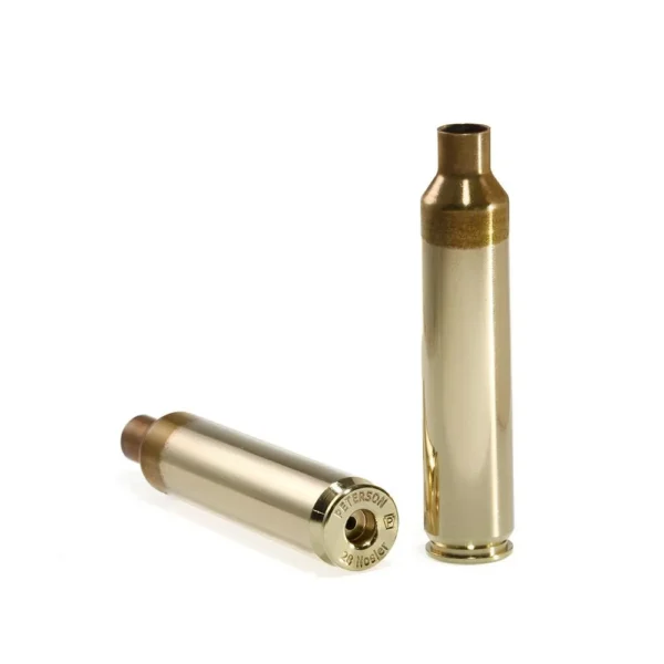 Peterson Unprimed Rifle Brass 28 Nosler two gold-tone cases, one upright and one on its side