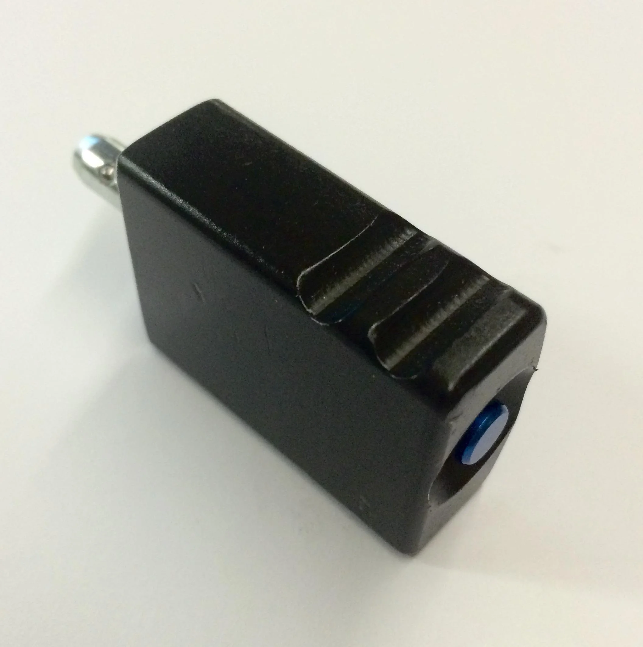 primary-45530 Masterpiece Arms Rotating Barricade Stop, angled black block with ridged top and silver pin
