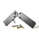 Trailblazer Firearms LifeCard open gray folding handgun with three cartridges