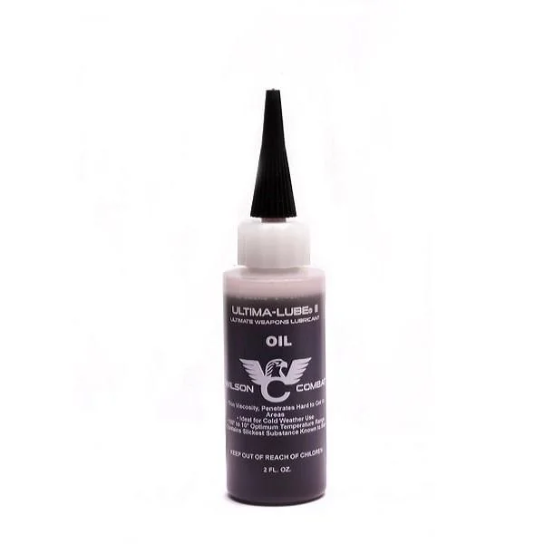 Wilson Combat Ultima-Lube II Oil dark bottle with white nozzle and black pointed cap