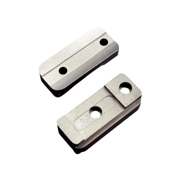 Talley Stainless Steel Base, top angled view of two silver mounting pieces with screw holes