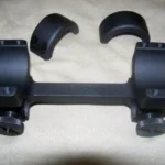 DNZ 1-Piece Freedom Reaper Picatinny Scope Mount, matte black top view with two rings and caps