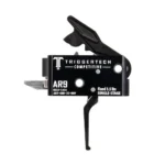 TriggerTech AR-9 Competitive flat trigger, black side view with housing and white markings
