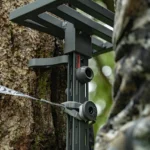 GSM Hawk Helium Hammock Small Platform, black metal platform strapped to a tree