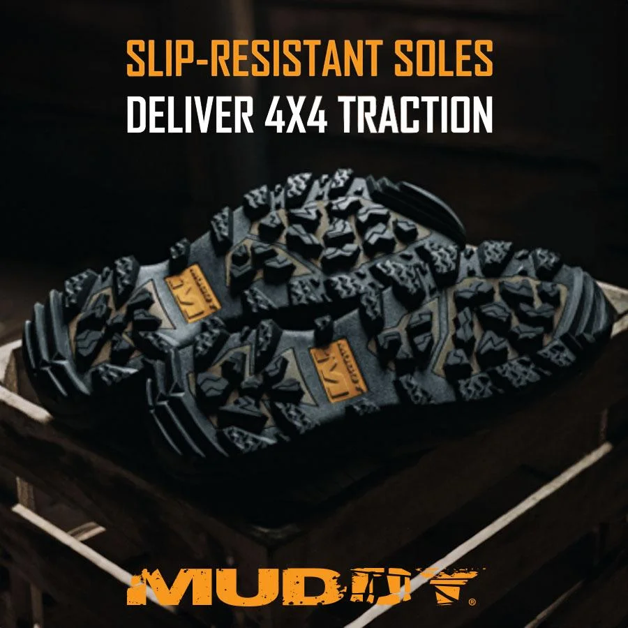 primary-46060 GSM Muddy DV8 Boots, bottom view of black lugged soles with Muddy branding
