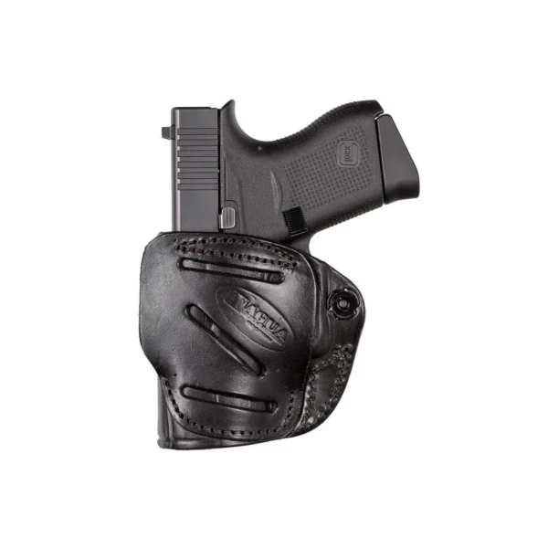 TX 1836 by Tagua black right-hand leather holster holding a compact black handgun