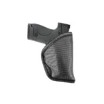 Tagua TX 1836 Gecko black holster, side view holding a black pistol with textured grip