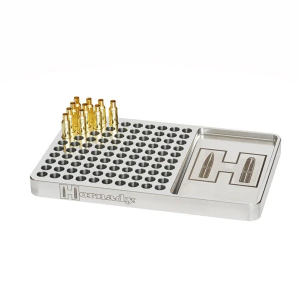Hornady Aluminum Loading Block non-anodized silver block with cartridge cases, top view