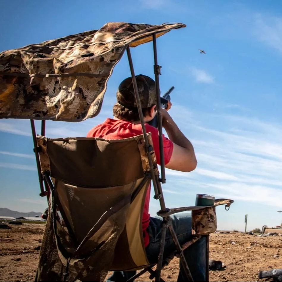 primary-46783 Higdon Outdoors Momarsh Tactical Dove Chair Optifade Marsh, rear view in field with canopy deployed