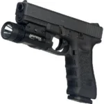 Nightstick Metal Weapon-Mounted Light, black right-side view mounted under a handgun barrel
