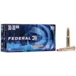 Federal Power-Shok Rifle Ammunition, blue box with two brass cartridges displayed beside it