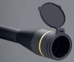 Leupold Alumina Flip Back Lens Cover, black and open on the front of a scope