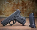 Pachmayr/Tacstar Division Grip Extender XL Glock 26273339, black extender beside handgun