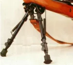 Harris Bipods Leg Notch Solid Base, front angled view mounted on a wood-stock rifle