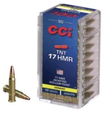 CCI TNT Rimfire Ammunition, clear plastic box with blue label and three loose cartridges