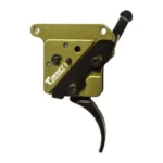 Timney trigger for Remington 700 gold housing with safety and black curved trigger, side view