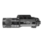 Surefire X300V-B, black weapon light in side view with textured bezel and T-slot mount