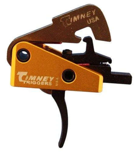 Timney Trigger Fits AR10, gold and black side view with solid curved trigger