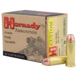 Hornady Custom Handgun Ammunition, tan box with two brass cartridges and copper-colored bullets
