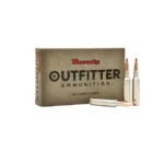 Hornady Outfitter Rifle Ammunition box with two upright cartridges and one cartridge lying in front