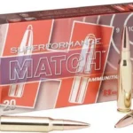 Hornady Superformance Match red ammunition box with five brass cartridges in front view
