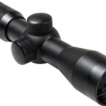 NcSTAR TACTICAL SERIES 4X30 COMPACT SCOPE/BLUE LENS, black angled side view with adjustment knobs