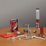 Hornady Lock-N-Load Classic Deluxe Kit, red reloading tools and accessories arranged on a table