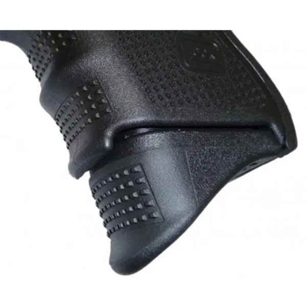 PEARCE GRIP EXT black grip extension installed on a textured handgun grip, side view