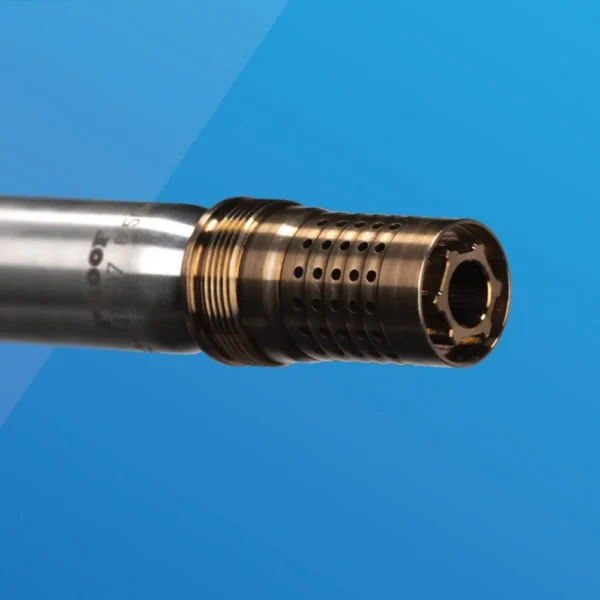Q LLC Q Cherry Bomb muzzle brake in bronze, close-up side and front view attached to a barrel