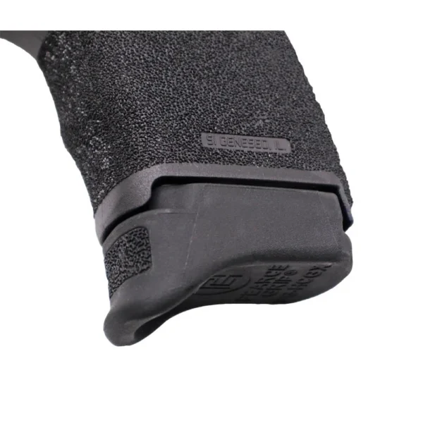 Pearce Grip Magazine Extension, black angled view installed on a textured pistol grip