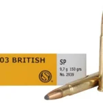 Sellier & Bellot ammunition, yellow box beside two brass cartridges, one upright