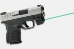 LaserMax LMS-Micro Rail Mounted Laser, black unit mounted beneath a pistol with green beam visible